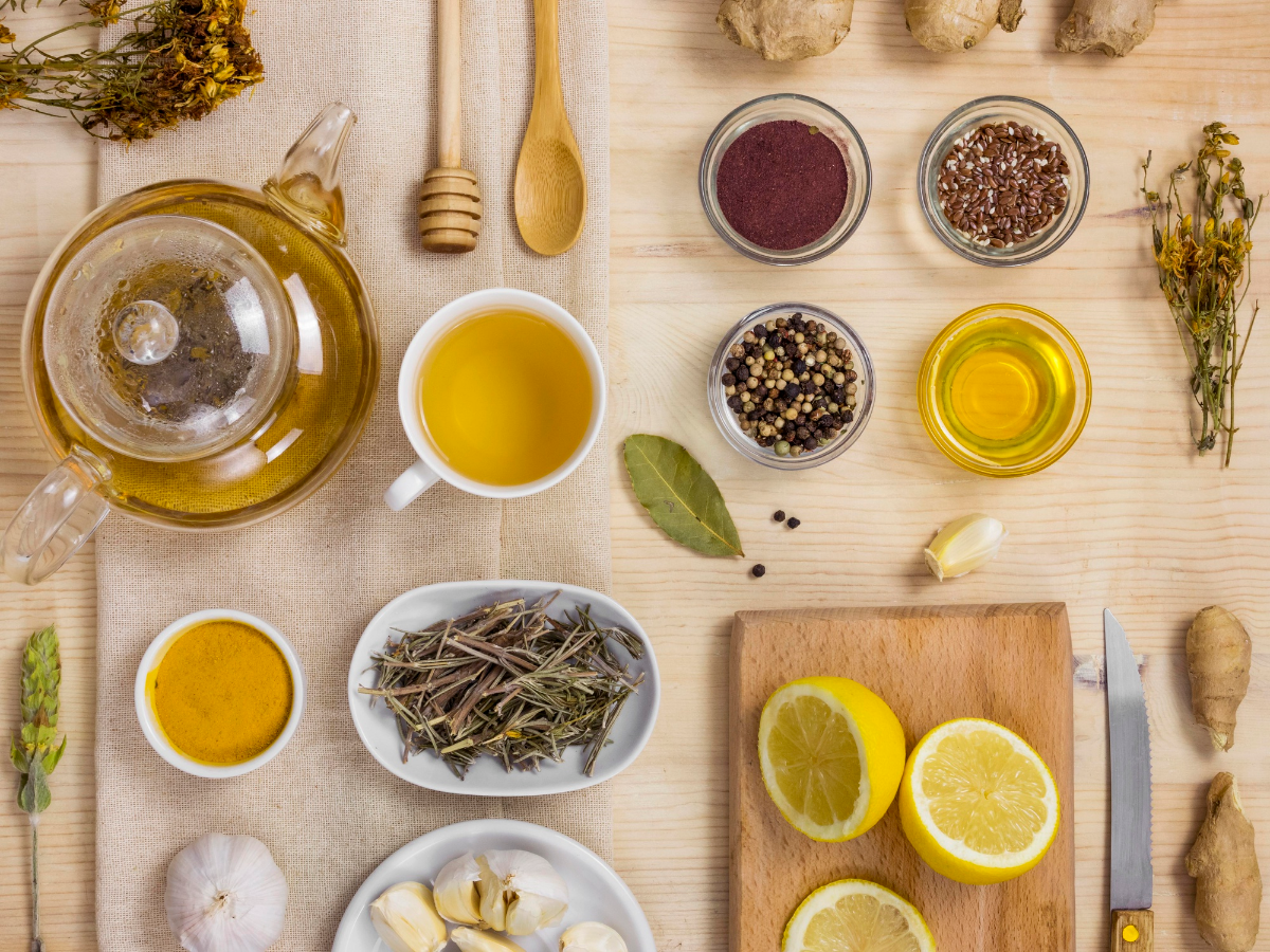 A selection of superfoods like turmeric, blueberries, spinach, and nuts, with icons representing relief from common health problems such as inflammation, fatigue, and poor digestion.